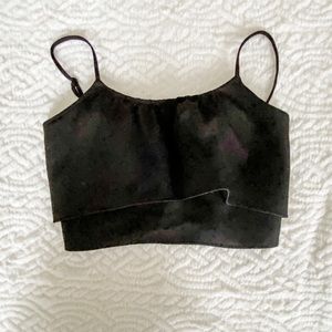 Two layers, looks great without needing a bra